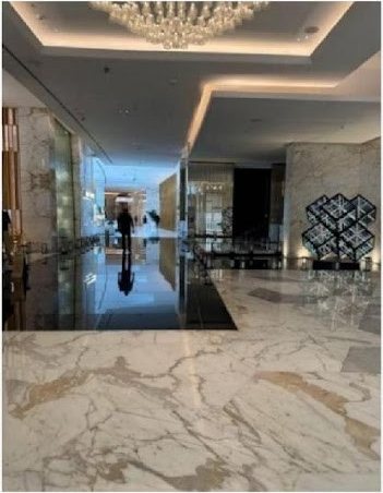 Lobby with chandelier and reflecting floor